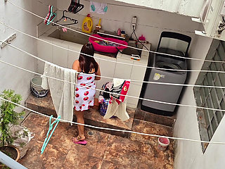 The Neighbor Is Watched Washing Clothes by Her Neighbor