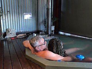 Ebony MILF Gets Her Ass Eaten and Pussy Fingered in a Hot Tub
