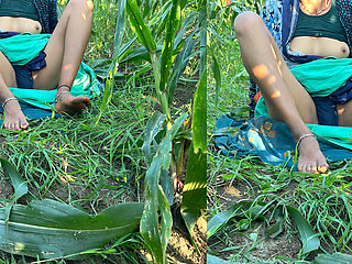 The sister-in-law of the village shows her figure in the open field, a tight-bodied, Indian-looking woman.