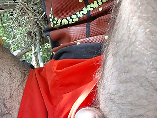My cock is hard and sticking out of the shorts