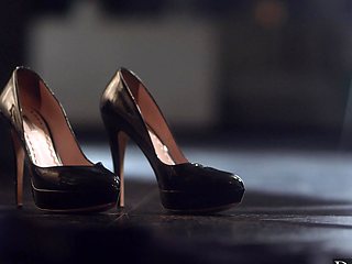 Riley Steele rides and moans on the bed with passion.