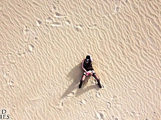 This MILF Masturbates Her Pussy in a Huge, Secluded Desert Landscape While a Drone Watches Her Closely