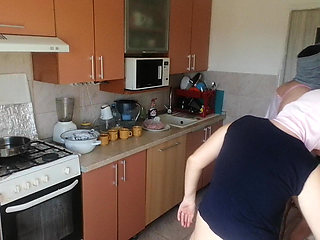 Amateur couple cooks naked in the kitchen