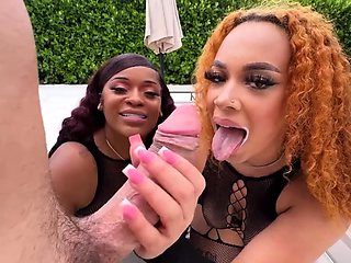 Ebony bombshells share white cock in interracial threesome