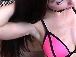 Stunning Brunette in Sexy Neon Pink Bikini and Leather Boots Ballgags Herself