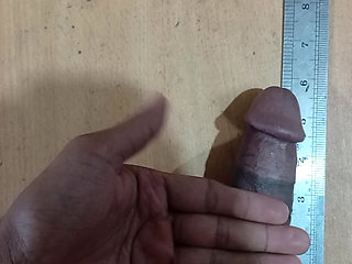 Desi boy Measure your own weight with a scale.