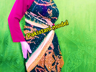 Desi Pakistani married woman wearing saree