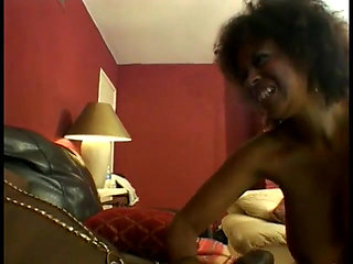 Black stud gets his cock worshiped by horny slut on the couch