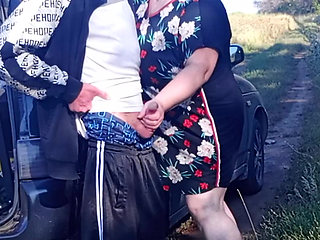 Stepmom holds my dick while I pee and then sucks it in public