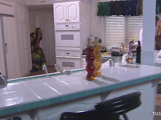 Lucky mature guy fucks a young brunette in the kitchen