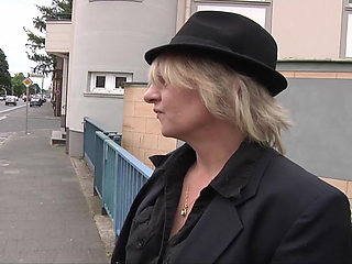 German cougar stuffs herself with a big dildo