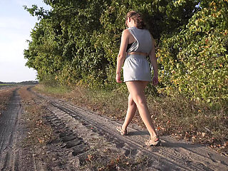 Hot Amateur Girl Flashes Thong Ass Under Skirt While Walking in Park