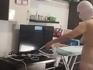 Sexy Brunette Doing Naked Chores Around the House