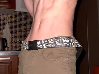 The guy undresses and unbuttons the fly, jerks off and cums a lot on the floor