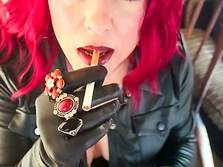 Your Mistress Tina Snua Dressed in Leather Chain Smoking 2 Cork Cigarettes