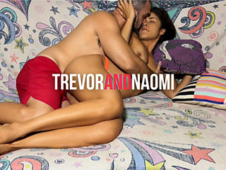 Couple cuddles on the sofa, including massage and oral sex on the pussy