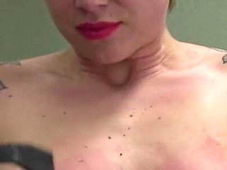 Tattooed Cora breast whip