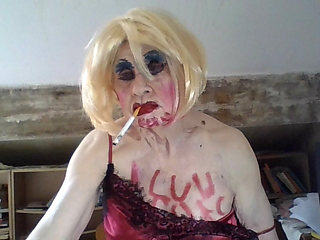 Femboi fag whore Sarah writes on her body, smokes, fingers her hole, and wanks to cumshot
