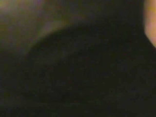 Robe-wearing Dominatrix