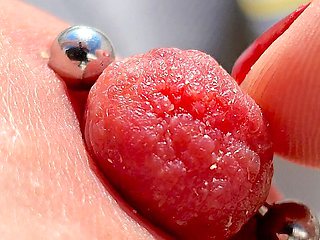 Playing Pierced Nipples Close up on Balcony