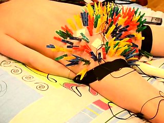 more than a hundred clothespins on her butt!