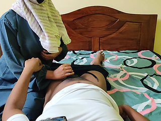 Beautiful Indonesian Muslim MILF with Big Boobs