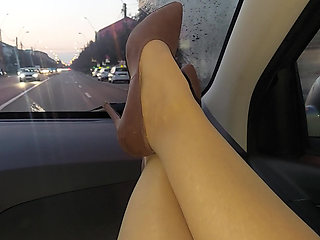 Stepmom in nylon stockings and high heels seduces her stepson in the car in public
