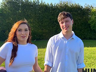 Suzie Sparklez cheats on her husband with her lover outdoors in a steamy scene.