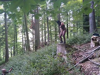 I Masturbate and Stick a Dildo in My Pussy While Standing on a Wooden Stump