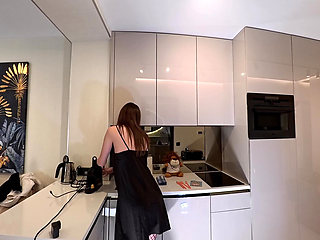 Hot sexy long legs brunette wife in black and red fishnet stockings with a satin nightie teases in the kitchen