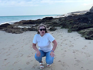 Peeing in Tight Jeans on the Beach