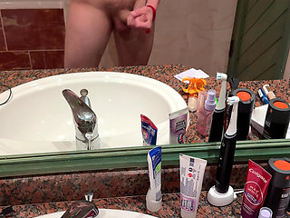 Watch me jerking off in the hotel mirror my friends are in the other room (: