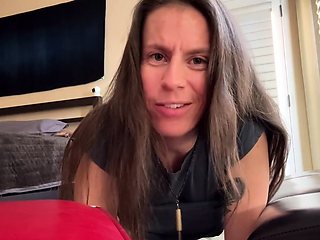 MILF babe masturbates by the fireplace