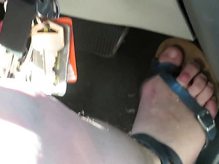 Revving Close up of my sandaled feet while I push the gas and break pedals !