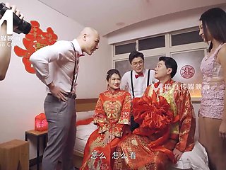 Sweet asian teen gets shared by two lustful guys in bed after the wedding