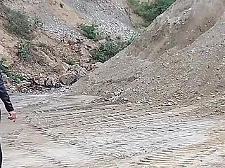 Grandma Is Walking Around a Gravel Pit in Tight Leggings and High Heels!