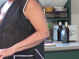 German housewife rides dick in the living room