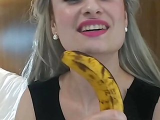 Horny blonde inserts her banana while her stepfather watches her