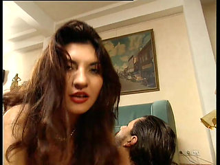 Omg! Busty Brunette in Latex Gets Fucked by Two Guys on Couch