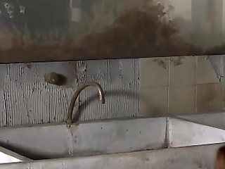 Riding his cock in a public restroom