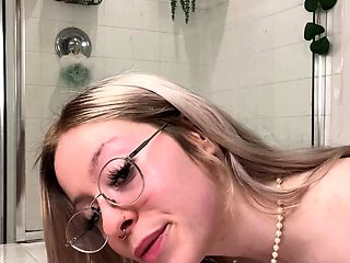 Big Breated Blond Bimbo Plays With A Toy Cock