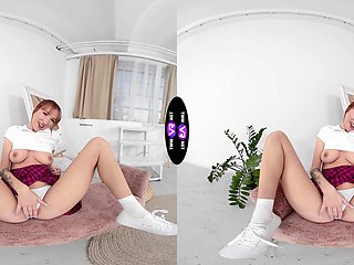 Redheaded Lilly in a tight miniskirt and thong gets her sweet spot fingered while wearing sneakers