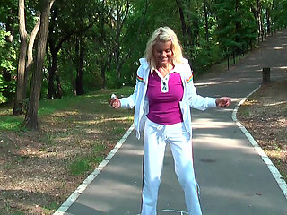 Beautiful blonde does outdoor blowjob