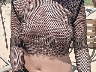 flashing tits and pussy on the beach