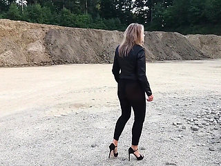 Grandma Is Walking Around a Gravel Pit in Tight Leggings and High Heels!
