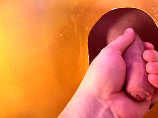 Young straight guy with a big cock at the gloryhole