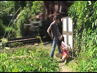 Sexy young busty girl takes a couble of nice cocks outdoor