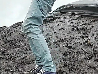 Dirty Twink with Dildo and Sneakers in the Mud