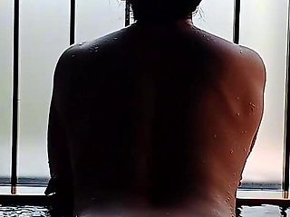 A Married Woman Taking a Bath in a Hotel Room