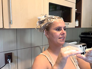 Hair Wash with Dishwasher Liquid in Kitchen Sink